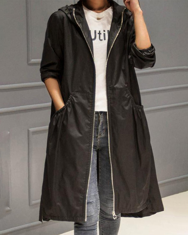 Adrienne | Trench Coat Women Love in a Pleated Longline Fit